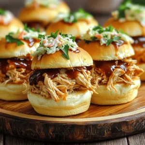 - 2 lbs boneless, skinless chicken breasts - 1 cup BBQ sauce (store-bought or homemade) - Slider buns (12 count) - 1/2 cup chicken broth - 1 tablespoon apple cider vinegar - 1 tablespoon brown sugar - 1 teaspoon garlic powder - 1 teaspoon onion powder - 1/2 teaspoon smoked paprika - Salt and pepper to taste - Coleslaw (optional) - Freshly chopped parsley (for garnish) For this recipe, the main ingredients are quite simple. You need chicken breasts, BBQ sauce, and slider buns. The chicken forms the base. The BBQ sauce gives it that sweet, tangy flavor we love. The slider buns hold everything together. Now, let’s talk about the flavor enhancers. Chicken broth adds moisture. Apple cider vinegar gives a nice tang. Brown sugar balances the flavors with sweetness. Garlic and onion powders add depth. Smoked paprika gives a hint of smokiness, while salt and pepper round out the taste. For toppings, coleslaw is a great choice. It adds crunch and creaminess. A sprinkle of fresh parsley on top makes the sliders look nice. It also adds a touch of freshness. With these ingredients, you can create a tasty meal that everyone will enjoy. To start, layer the chicken breasts evenly in your slow cooker. This helps them cook well. Next, grab a mixing bowl and combine your sauce ingredients. You need BBQ sauce, chicken broth, apple cider vinegar, brown sugar, garlic powder, onion powder, and smoked paprika. Add salt and pepper to taste. Mix all these ingredients until they blend nicely. This step gives the chicken great flavor. Now it’s time to cook! Set your slow cooker to low for 6-8 hours. You can also choose the high setting for 3-4 hours. When the chicken is done, it should be tender. You’ll know it’s ready when you can easily shred it with a fork. This means all those tasty flavors soaked in well. Once the chicken is cooked, carefully take it out of the slow cooker. Place it in a large bowl. Use two forks to shred the chicken into small pieces. This makes it easy to put on your sliders. After shredding, mix the chicken with the remaining sauce in the slow cooker. This ensures every bite is full of flavor. Now, prepare your slider buns. You can lightly toast them under a broiler or in a toaster until golden brown. This adds a nice crunch. Finally, serve the pulled chicken on the slider buns. If you like, add a spoonful of coleslaw on top for some extra crunch. Enjoy your delicious sliders! To boost the taste of your BBQ pulled chicken, consider making your own BBQ sauce. A mix of ketchup, vinegar, and spices gives great flavor. You can also adjust the sweetness by adding brown sugar. Start with one tablespoon and add more if you like it sweeter. When it comes to shredding chicken, use two forks. This method gives you nice, even pieces. For even cooking in the slow cooker, place the chicken in a single layer. Arrange it well to help it cook evenly and soak up all that sauce. Arrange your sliders neatly on a large platter. This makes them look great for a party. Consider adding a spoonful of coleslaw on top for crunch. For drinks, iced tea or lemonade pairs well with the sliders. {{image_4}} If you need gluten-free sliders, here are some easy swaps. Use gluten-free buns instead of regular ones. Look for BBQ sauces that are marked gluten-free. Many brands offer tasty options that fit this need. You can also reduce sugar in your dish. Choose a low-sugar BBQ sauce. Some brands use natural sweeteners or extra spices to keep flavor high and sugar low. This way, you can enjoy your sliders without worry. Want to spice things up? Add some cayenne pepper or chili powder to your sauce. Just a pinch can bring a nice kick. If you like it hot, try using hot sauce in the mix too. You can also switch the type of chicken you use. Chicken thighs are great for a richer taste. They stay juicy and tender, which is perfect for pulled chicken. You can also try cooking with bone-in chicken for extra flavor. You don’t have to stick to regular slider buns. Try serving your pulled chicken on pita or tortillas. These options add fun and are easy to handle. For coleslaw, mix it up! You can add apples for a sweet crunch or jalapeños for some heat. A zesty dressing can also add a new twist. Choose what you love, and make your sliders even more exciting! After your meal, store any leftover pulled chicken in the fridge. Place it in an airtight container. This will keep it fresh and flavorful. The chicken will stay good for about 3 to 4 days. When you’re ready to enjoy the leftovers, reheating is easy. You can use the microwave or the stovetop. For the microwave, put the chicken in a bowl. Heat it for 1-2 minutes. Stir halfway through to warm it evenly. On the stovetop, place the chicken in a pan over low heat. Stir occasionally until it’s hot. To save your BBQ pulled chicken for later, freezing is a great option. First, let the chicken cool down completely. Then, transfer it to a freezer-safe bag or container. Squeeze out as much air as you can. This helps prevent freezer burn. You can freeze it for up to 3 months. When you want to eat it, thaw the chicken in the fridge overnight. For a quicker method, you can microwave it on the defrost setting. After thawing, reheat it using the same methods as before. The shelf life of your pulled chicken varies by storage method. In the fridge, it lasts about 3 to 4 days. In the freezer, it can stay good for about 3 months. Always check for signs of spoilage before eating. If it smells off or looks strange, it’s best to throw it away. Can I use frozen chicken for this recipe? Yes, you can use frozen chicken. Just add a bit more cooking time. When using frozen chicken, cook on high for 4-5 hours or low for 8-10 hours. Always check that it reaches 165°F. How do I make the sliders spicier? To spice things up, add hot sauce to the BBQ sauce. You can also mix in cayenne pepper or diced jalapeños. Start with a little and taste as you go. What BBQ sauce is best for this recipe? Choose a BBQ sauce you love. A tangy or sweet sauce works well. You can use store-bought or make your own at home. Can I use other meats besides chicken? Yes, you can use pork or beef. For pulled pork, use a pork shoulder. For beef, try brisket or chuck roast. Just adjust cooking times as needed. How long can I keep leftovers? Store leftovers in the fridge for up to four days. Keep them in an airtight container. You can also freeze them for up to three months. This article covered all you need for making tasty slow cooker BBQ pulled chicken sliders. We discussed essential ingredients, flavorful enhancers, and how to prepare and cook the chicken perfectly. You learned tips for serving and adjusting flavors. Now you can enjoy these sliders at any gathering. They are easy, fun, and full of flavor. You also have options for dietary needs and creative toppings. So, get cooking and impress your friends with your delicious sliders!
