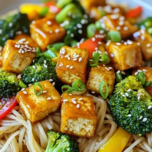 - 1 block firm tofu, well-drained and pressed - 200g rice noodles - 1 cup broccoli florets - 1 bell pepper, sliced into thin strips - 2 green onions, finely chopped - 3 tablespoons teriyaki sauce - 1 teaspoon sesame seeds, toasted - Salt and pepper to taste - Fresh herbs like cilantro or basil - Alternative vegetables such as carrots or snap peas When I make Minute Crispy Teriyaki Tofu Noodles, I focus on the key ingredients. Firm tofu is my first choice. It holds its shape well and becomes crispy. Rice noodles cook fast and soak up flavors nicely. Add a mix of colorful vegetables like broccoli and bell peppers. They bring crunch and nutrients to the dish. For seasoning, teriyaki sauce is a must. It adds that sweet and savory taste I love. A sprinkle of sesame seeds gives a nice crunch and flavor boost. I adjust the salt and pepper to my liking. If you want to elevate your dish, fresh herbs are great. They add freshness and brightness. I often use cilantro or basil. You can also swap in other veggies based on what you have. Carrots or snap peas work well too. This flexibility makes the dish fun and unique every time. 1. Cutting and pressing the tofu: Start by cutting the pressed tofu into even cubes. Aim for bite-sized pieces, about one inch each. This size helps them cook faster and get crispy. 2. Coating the tofu with cornstarch: Place the tofu cubes in a bowl. Sprinkle the cornstarch over the tofu. Toss the cubes gently until they are fully coated. This step is key to achieving that perfect crispy texture. 1. Heating the pan and frying tofu: Heat vegetable oil in a large skillet over medium-high heat. Wait until the oil shimmers. Carefully add the coated tofu cubes. Fry them for 5-7 minutes. Turn them often with a spatula to get golden brown on all sides. 2. Cooking the rice noodles: While the tofu fries, cook the rice noodles according to the package instructions. Aim for an al dente texture. Once done, drain and set aside for later. 1. Adding vegetables and teriyaki sauce: Once the tofu is crispy, add broccoli florets and sliced bell pepper to the skillet. Sauté these for 3-4 minutes. Stir regularly until the veggies are bright and tender. 2. Final cooking to combine flavors: Next, fold the cooked rice noodles into the skillet. Pour in the teriyaki sauce. Stir everything well, ensuring the sauce coats the noodles and vegetables. Cook for an extra 1-2 minutes until everything is hot. Now, your Minute Crispy Teriyaki Tofu Noodles are ready to serve! Enjoy your meal! To make crispy tofu, start with firm tofu. Press it well to remove excess water. Cut the tofu into even cubes for uniform cooking. Coat the tofu evenly with cornstarch. This helps create a crunchy outer layer. When cooking, use a hot pan with vegetable oil. Heat the oil until it shimmers. If the heat is too low, the tofu will become soggy. Turn the tofu pieces often to cook all sides evenly. Aim for a golden-brown color for the best crisp. For rice noodles, follow the package instructions closely. Soak them in hot water until soft, but not mushy. Drain and rinse with cold water to stop the cooking process. This helps prevent sticking. To keep noodles from sticking, toss them with a bit of oil after draining. You can also add them to the skillet right away. This helps to coat them with sauce and keeps them moist. To boost flavor, try adding extra sauces. Sriracha, hoisin, or soy sauce can add a nice kick. Fresh ginger or garlic can enhance the dish as well. For more depth, sprinkle on sesame seeds or chopped green onions. You can also add a dash of lime juice for brightness. These simple additions make your dish even more delicious. {{image_4}} You can switch out tofu for other proteins. Tempeh or chickpeas work well. Both options add texture and flavor. You can also use seitan for a meat-like bite. Adding different vegetables can change the dish. Try using snap peas, carrots, or mushrooms. Each veggie adds its own taste and crunch. Mix and match to find your favorite combo. For gluten-free noodles, use rice noodles or quinoa noodles. Both options cook quickly and fit nicely. Look for brands that label their products gluten-free. When it comes to sauces, check the labels on teriyaki sauce. Some have gluten. You can also make your own sauce with tamari instead. This keeps the flavor without the gluten. Make this dish ahead of time for busy weeks. Cook the tofu and noodles but store them separately. This keeps them fresh and tasty. For storage, use airtight containers. You can keep them in the fridge for up to three days. When you’re ready to eat, just reheat in a pan. Add a splash of water to keep the noodles moist. To store your leftover Minute Crispy Teriyaki Tofu Noodles, place them in an airtight container. This keeps them fresh and prevents any strong odors. Make sure to cool the dish to room temperature before sealing. Leftovers are best if eaten within three days. After that, the texture may change, and the flavors may fade. You can freeze these noodles, but it’s better to freeze just the tofu and veggies. Cooked noodles may become mushy when thawed. To freeze, let the tofu and veggies cool completely. Then, place them in a freezer-safe bag or container. They can stay frozen for up to two months. When you’re ready to eat, thaw them overnight in the fridge. To reheat your noodles, you have a few good options. The skillet method works best. Heat a little oil in a pan over medium heat. Add the noodles and stir until hot. You can also use a microwave. Place the noodles in a bowl and cover it with a damp paper towel. Heat in short bursts, stirring in between to keep them from drying out. Enjoy your meal hot, with the same great texture and flavor! To make tofu crispy, start with firm tofu. Drain and press it well to remove excess moisture. Cut the tofu into uniform cubes for even cooking. Then, coat the tofu cubes with cornstarch. This creates a crunchy outer layer. Heat vegetable oil in a skillet until shimmering, then add the tofu. Cook it for 5-7 minutes, flipping occasionally. You want a golden-brown exterior. - Use firm or extra-firm tofu for best results. - Press tofu for at least 15 minutes to remove moisture. - Toss the tofu gently in cornstarch for an even coat. Yes, you can use other types of noodles. While rice noodles work well, other options include: - Udon noodles: These are thicker and chewy. - Soba noodles: They add a nutty flavor. - Egg noodles: These are rich and hearty. Feel free to experiment with what you have at home. Just follow the cooking instructions on the package for the best texture. For a complete meal, consider these side dishes: - Steamed edamame: They add protein and fiber. - Cucumber salad: It offers a refreshing crunch. - Miso soup: This pairs well with the flavors of teriyaki. These sides enhance your meal and add variety to your plate. Enjoy! This blog post explored making teriyaki tofu noodles, covering essential ingredients, preparation, and tips. We learned about firm tofu, rice noodles, and vegetables, with seasoning from teriyaki sauce. Proper cooking and combining techniques ensure great flavor and texture. Remember to store leftovers correctly and consider variations for different diets. Achieving crispy tofu is key, and experimenting with sides can make your meal even better. Now, you have all the tools to create a delicious dish that fits your needs and tastes!