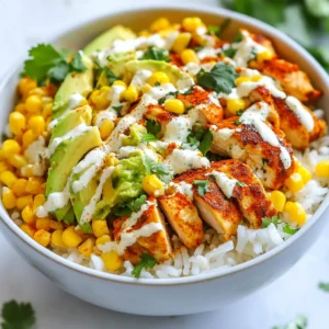 - 2 cups cooked white rice - 1 lb chicken breast, diced - 1 cup corn kernels - 1 red bell pepper, diced - 1/2 cup red onion, finely chopped - 1 ripe avocado, sliced - 1 cup cotija cheese, crumbled - Fresh cilantro leaves - 1/4 cup mayonnaise - 2 tablespoons freshly squeezed lime juice - 1 teaspoon smoked paprika - 1 teaspoon chili powder - Salt and pepper - 1 tablespoon olive oil In this recipe, we start with simple yet vital ingredients. The base is 2 cups of cooked white rice. It holds everything together and adds a nice texture. Next, we have 1 pound of chicken breast, diced into bite-sized pieces. This chicken brings protein and flavor. We also use 1 cup of corn kernels. Fresh or frozen works well and adds sweetness. For the vegetables and toppings, we include 1 diced red bell pepper and 1/2 cup of finely chopped red onion. These add color and crunch. A sliced ripe avocado gives creaminess to the dish. We finish with 1 cup of crumbled cotija cheese for a salty kick and some fresh cilantro leaves for a bright touch. To bring it all together, we add seasonings and dressings. Use 1/4 cup of mayonnaise mixed with 2 tablespoons of lime juice for a zesty sauce. A teaspoon each of smoked paprika and chili powder adds depth. Don’t forget salt and pepper to taste, along with 1 tablespoon of olive oil for cooking. These ingredients combine to create a colorful and tasty meal. Each bite is packed with flavor and texture. {{ingredient_image_2}} Heat a tablespoon of olive oil in a large skillet over medium heat. Once hot, add one pound of diced chicken breast. Season the chicken with smoked paprika, chili powder, salt, and pepper. Cook it for eight to ten minutes. Stir occasionally until the chicken turns golden brown and is fully cooked. Remove the skillet from the heat and set the chicken aside. In the same skillet, add one cup of corn kernels and one diced red bell pepper. Sauté them for about three to four minutes. Stir gently until the corn has a slight char and the peppers are tender. Once cooked, take the skillet off the heat. In a small bowl, whisk together a quarter cup of mayonnaise and two tablespoons of freshly squeezed lime juice. This creamy lime sauce will bring a bright flavor to the bowls. Start by putting two cups of cooked white rice at the bottom of each serving bowl. Next, layer on the cooked chicken. Add the sautéed corn and peppers, followed by attractive slices of avocado on top. Drizzle the creamy lime sauce generously over each bowl. Then, sprinkle crumbled cotija cheese for added flavor. If you like, garnish with fresh cilantro leaves to make the dish pop. Serve the Street Corn Chicken Bowls while they are warm and fresh. This will ensure you enjoy the best flavors and textures. You can also add lime wedges for an extra zing! To cook chicken just right, start with fresh meat. Cut your chicken into bite-sized pieces for even cooking. Heat olive oil in a skillet over medium heat. When the oil is hot, add your seasoned chicken. Use smoked paprika and chili powder for great flavor. Stir the chicken often. Cook it for about 8-10 minutes. Look for a golden brown color and ensure it’s cooked through. Always check the thickest part to avoid any pink. Once done, set it aside to rest. This helps keep it juicy. To get that charred flavor in corn, use high heat. You can use fresh corn or frozen kernels. If using frozen, let them thaw first. After cooking your chicken, use the same skillet. This adds flavor from the chicken bits left behind. Add the corn and diced red bell pepper. Sauté them for about 3-4 minutes. Stir gently to avoid breaking the corn. Look for a slight char on the corn. This gives that smoky taste we love in street corn. To keep your Street Corn Chicken Bowls fresh, store each part separately. Place rice, chicken, and veggies in different containers. This keeps textures nice. Make sure the lids are tight to avoid drying out. In the fridge, they should last for about 3-4 days. When reheating, use the microwave or stovetop. Add a splash of water to keep things moist. Heat gently to avoid overcooking. Enjoy your leftovers warm and tasty! Pro Tips Perfectly Cooked Chicken: To ensure your chicken remains juicy, avoid overcooking it. Remove it from the heat once it reaches an internal temperature of 165°F (74°C). Fresh Corn Flavor: If using fresh corn, grill the ears for a few minutes before cutting the kernels off to enhance the sweetness and add a smoky flavor. Customize Your Toppings: Feel free to add extra toppings like pickled jalapeños, black beans, or even a drizzle of hot sauce for additional flavor and texture. Make-Ahead Rice: Prepare the rice in advance and store it in the refrigerator. This will save you time when assembling the bowls and help keep everything fresh. {{image_4}} For a vegetarian twist, you can swap out chicken for plant-based protein. This change keeps the dish hearty and satisfying. Try using tofu or tempeh for a protein boost. You can marinate the tofu with lime juice and spices to add flavor. Sauté it until golden for that nice texture. If you love heat, add some jalapeños or spicy sauce. You can chop fresh jalapeños and mix them in with the corn and peppers. This gives your bowls a nice kick. For those who enjoy heat, drizzle some hot sauce over the top. It enhances the flavors and adds excitement. To make this dish gluten-free, ensure that your sauces and ingredients are safe. Use gluten-free mayonnaise or skip the mayo completely. You can also check the labels on the corn and spices. Most ingredients in this recipe are naturally gluten-free, making it easy to adapt. Enjoy your bowls without worry! To store your assembled Street Corn Chicken Bowls, let them cool first. Place them in airtight containers. You can keep them in the fridge for up to three days. Make sure to separate the avocado slices if you want them fresh longer. It’s best to add the lime sauce just before you eat. If you want to freeze the components, do it separately. Freeze the cooked chicken and corn in freezer-safe bags. You can store them for up to three months. Cooked rice can also be frozen. Just make sure to cool it before putting it in the freezer. Store the toppings like avocado and cheese in the fridge, as they do not freeze well. To reheat the chicken and corn, use a skillet over medium heat. Add a splash of water to keep them moist. Heat until warm, but not dry. For rice, add a little water, cover, and heat in the microwave. Stir occasionally. This will help keep the flavor and texture just right. Reheat the lime sauce separately, if you want it warm, or use it cold. You can use many proteins instead of chicken. Try grilled shrimp or tofu for a veggie option. Black beans or chickpeas add protein and flavor. Each choice gives a nice twist to the dish. Yes, you can prepare this dish in advance. Cook the chicken, corn, and peppers, and store them separately. Keep the rice in a closed container. Mix it all together when you're ready to serve. You can add more toppings to suit your taste. Try diced tomatoes, jalapeños, or sour cream for extra creaminess. Fresh lime wedges give a zesty kick. These additions boost flavor and make your bowl unique. Leftovers stay fresh for about three to four days in the fridge. Store them in airtight containers. Reheat in the microwave, but be careful not to overcook. Enjoy your tasty meal again! These Street Corn Chicken Bowls are a fun and easy meal. You learned about the key ingredients, seasoning, and step-by-step instructions. I shared tips for cooking chicken and achieving great flavors. With variations for different diets, everyone can enjoy this dish. Don’t forget the storage tips to keep leftovers fresh. Try out these ideas, and customize your bowls to your liking. I hope you feel inspired to make this tasty recipe for you and your family. Enjoy each bite!