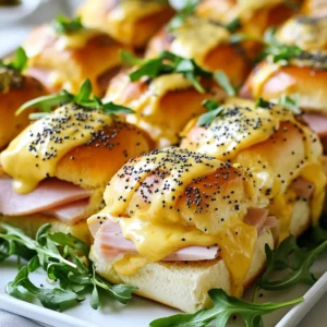 For these tasty sliders, you will need: - 12 slider buns - 1 pound sliced ham - 8 ounces Havarti cheese, sliced - 1/4 cup unsalted butter, melted - 1 tablespoon Dijon mustard - 1/2 teaspoon garlic powder - 1 teaspoon poppy seeds - Salt and pepper to taste - Fresh arugula or spinach for garnish These ingredients create a savory blend. Each item plays a key role in flavor and texture. You can switch out some ingredients if needed: - Slider buns: Use whole wheat buns or gluten-free options for a healthier choice. - Sliced ham: Turkey or chicken can work well if you want a lighter flavor. - Havarti cheese: Try gouda or mozzarella for a different cheese taste. - Unsalted butter: Olive oil or a dairy-free spread can replace the butter. - Dijon mustard: Yellow mustard or honey mustard adds a nice touch too. These swaps let you adjust the sliders to fit your taste or dietary needs. Serve these sliders with fun sides to make a meal: - Pair them with a fresh salad for a light option. - Serve with sweet potato fries for a twist on tradition. - Add dipping sauces like honey mustard or barbecue for extra flavor. These ideas make your slider meal even more enjoyable. Explore different combinations to find what you love! {{ingredient_image_2}} First, set your oven to 350°F (175°C). This heat helps cook the sliders evenly. While the oven warms, grab a baking dish. Coat it lightly with cooking spray or butter. This step keeps the sliders from sticking. In a small bowl, melt 1/4 cup of unsalted butter. Add 1 tablespoon of Dijon mustard to the melted butter. Then, mix in 1/2 teaspoon of garlic powder. Finally, add a pinch of salt and pepper. Whisk all the ingredients until they blend well. This mixture gives the sliders a tasty top. Take your slider buns and slice them in half. Keep the top and bottom halves attached. Place the bottom halves in the greased baking dish. Start layering by adding half of the sliced ham. Make sure to cover every bun. Next, add a generous layer of Havarti cheese on the ham. Then, add the rest of the ham on top. Gently place the top halves of the buns over the stacked ham and cheese. Drizzle the mustard butter mixture on top of the buns. Sprinkle poppy seeds over the sliders for extra flavor. Cover the dish with aluminum foil. Bake for 15 minutes. This keeps the cheese melty and warms the ham. After 15 minutes, remove the foil. Bake for an extra 5-10 minutes. Look for bubbling cheese and golden-brown tops. When done, take the dish out and let it cool for a few minutes. Use a spatula to lift the sliders carefully. Garnish with fresh arugula or spinach. Slice the sliders for serving, and enjoy! To get that perfect melt with Havarti cheese, you need to use low heat. Bake your sliders at 350°F (175°C) for the right time. Cover them with foil for the first part of baking. This keeps the heat in and helps the cheese melt nicely. After 15 minutes, take off the foil to let the top brown. The cheese should be gooey and stretchy. If you want more flavor, mix in some shredded cheese with the Havarti. Want to add a kick to your sliders? You can tweak the spices to fit your taste. Add a pinch of cayenne pepper for heat. If you love herbs, sprinkle in some dried oregano or thyme. For a sweet touch, mix in a bit of honey with your mustard. Always taste the mustard butter mixture before you add it to the sliders. Adjust the salt and pepper to your liking as well. Moist sliders are key to a tasty bite. Make sure to cover the baking dish with foil while baking. This traps steam, keeping the sliders soft. Use unsalted butter for the mixture, as it adds richness without overpowering. Serve sliders right after baking for the best texture. If you have leftovers, store them in an airtight container to keep them from drying out. A little extra melted butter on top before serving can also help add moisture back in. Pro Tips Use Fresh Ingredients: Always opt for high-quality, fresh ham and cheese for the best flavor and texture in your sliders. Customize Your Cheese: While Havarti is delicious, feel free to experiment with other cheeses like Swiss or Gruyère for different flavor profiles. Make Ahead: You can prepare the sliders in advance and store them in the refrigerator. Just pop them in the oven when you're ready to serve! Experiment with Toppings: Don't hesitate to add other toppings like caramelized onions or sliced jalapeños for an extra kick of flavor. {{image_4}} You can switch up the cheese in your sliders for fun. Cheddar offers a sharp taste. Swiss cheese adds a nutty flavor. Provolone melts well and has a mild taste. Pepper jack gives a spicy kick. Each cheese brings its own unique flavor, making your sliders special. Want to mix it up? Add layers of veggies like roasted peppers or sautéed onions. Fresh spinach or arugula gives a nice crunch. You could also use turkey or chicken instead of ham. This way, you can customize your sliders to fit your cravings. To make gluten-free sliders, use gluten-free buns or lettuce wraps. Look for brands that offer gluten-free options. For a low-carb version, skip the buns and use slices of cucumber or bell pepper. This keeps the taste while making it healthier. To keep your leftover sliders fresh, place them in an airtight container. If you don’t have one, wrap them tightly in plastic wrap. This helps prevent the buns from getting dry. Store them in the fridge for up to three days. If you want to keep them longer, consider freezing. When you’re ready to enjoy your sliders again, preheat your oven to 350°F (175°C). Place the sliders on a baking sheet. Cover them with foil to keep them moist. Heat for about 10 to 15 minutes. This method keeps the cheese melty and the buns soft. You can also use a microwave for quick reheating. Just heat them for about 30 seconds, but know the buns might get a bit chewy. If you want to freeze your sliders, assemble them without baking. Wrap each slider in plastic wrap, then place them in a freezer bag. They will last for up to three months. When you’re ready to bake, remove the sliders from the freezer, let them thaw in the fridge overnight, and then bake as directed. This way, you can enjoy fresh, warm sliders anytime! Yes, you can! These sliders are great with other meats. Try turkey or chicken for a leaner option. Roast beef adds a nice flavor, too. You can use any deli meat you like. Just make sure the meat pairs well with Havarti cheese. This cheese melts nicely and balances flavors. You can prepare the sliders a few hours in advance. Assemble them as the recipe says, but do not bake them yet. Cover the dish with plastic wrap and keep it in the fridge. When you're ready, bake the sliders straight from the fridge. Just add a few extra minutes to the bake time for best results. Dipping sauces can really enhance your sliders. Honey mustard brings a sweet and tangy kick. Barbecue sauce adds a smoky flavor that goes well with ham. You can also try ranch dressing for a creamy dip. For a zesty option, sriracha mayo mixes heat with creaminess. Pick your favorite and enjoy! In this blog post, we covered how to make delicious Ham and Havarti Sliders. You learned about the key ingredients, easy steps for baking, and tips for perfecting the sliders. We also explored variations and how to store leftovers. Remember, these sliders can be customized to fit your taste. Think about different cheeses or meats to try. Making these sliders is fun and allows for creativity. Enjoy every bite and share with others!